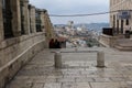 Two women sitting on the stairs watching around Bethlehem