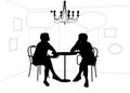 Two women speaking at the table in cafe Royalty Free Stock Photo