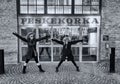 Two women stand in front of the Fish Market Feskekorka. Gothenburg, Sweden