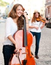 Two women strings duet playing