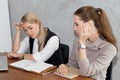 Two women are studying and teaching Royalty Free Stock Photo