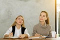 Two women are studying and teaching Royalty Free Stock Photo
