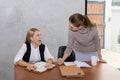 Two women are studying and teaching Royalty Free Stock Photo