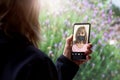 Two women talking to each other through a video call on a smartphone. Senior woman having a video chat with other woman on mobile Royalty Free Stock Photo