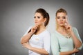 Two women thinking about something Royalty Free Stock Photo