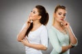 Two women thinking about something Royalty Free Stock Photo