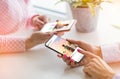 Two women using their mobile phones together Royalty Free Stock Photo