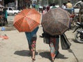 Two Women w/ Umbrellas in Kathmandu, Nepal Royalty Free Stock Photo