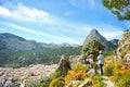 Two women walking along the Sierra de Grazalema Natural Park, Cadiz province, Spain