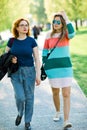 Two women walking together - having rest time