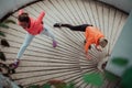 Two women warming up together and preparing for a morning run in an urban environment. Selective focus Royalty Free Stock Photo