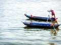 Two women rowing a boat