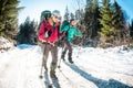 Two women in a winter hike Royalty Free Stock Photo