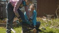 Two women working in the courtyard