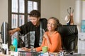 Two Women Working Together in a Creative Office Royalty Free Stock Photo