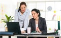 Two Women Working Together In Design Studio. Royalty Free Stock Photo