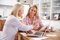 Two women working together at home Royalty Free Stock Photo