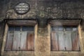 Two wood vintage window on the old wall, Chinese house style Royalty Free Stock Photo