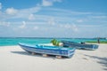 Two wooden blue color boats on the beach Royalty Free Stock Photo
