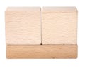 two wooden cubes on one brick create construction isolated on the white Royalty Free Stock Photo