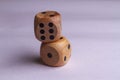 Two wooden dice isolated against a white background Royalty Free Stock Photo