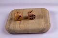 Two wooden dice isolated against a white background Royalty Free Stock Photo