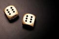 Two wooden dices on a black background Royalty Free Stock Photo