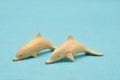 Two wooden dolphin figurines Royalty Free Stock Photo