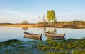 two wooden fishing boats in the lake . Royalty Free Stock Photo