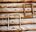 Two wooden frameworks on an ancient timbered wall