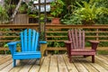 Two wooden garden chairs