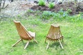 Two Garden chairs on the grass. Small green garden Royalty Free Stock Photo