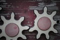 Two wooden gears with broken teeth Royalty Free Stock Photo