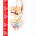 Two wooden hearts on string forming Christmas pattern Royalty Free Stock Photo