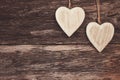 Two wooden hearts on wooden background. Copy space, soft focus, toned, vintage style Royalty Free Stock Photo