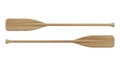 Two wooden paddles. Sport oars. Royalty Free Stock Photo