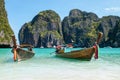 Two wooden traditional boats on the shore