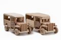 Two wooden vintage bus toys in the studio. Royalty Free Stock Photo