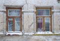 Two wooden windows on the old wall Royalty Free Stock Photo