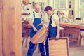 Two worker in a carpenter`s workshop Royalty Free Stock Photo