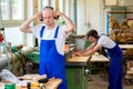 Two worker in a carpenter's workshop Royalty Free Stock Photo