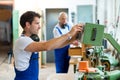 Two worker in a carpenter's workshop Royalty Free Stock Photo