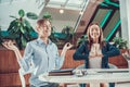 Two worker women meditating in office. Royalty Free Stock Photo