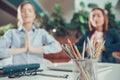 Two worker women meditating in office. Royalty Free Stock Photo