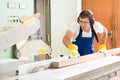 Two worker in workshop using saw machine Royalty Free Stock Photo
