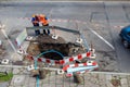 Two workers discuss about work near the pit Royalty Free Stock Photo