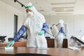 Two Workers Disinfecting Office Royalty Free Stock Photo