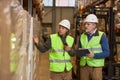 Two workers doing inspection at warehouse an Royalty Free Stock Photo
