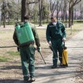 Two workers doing park disinfection spraying for prevention of Corona virus spreading