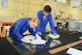 Two workers fixing glass Royalty Free Stock Photo